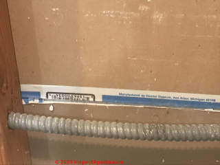 Domtar gypsum board back surface and edge tape identify the manufacturer and location (C) InspectApedia.com Sho