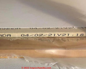 Drywall identification stamp on edge tape (C) InspectApedia.com