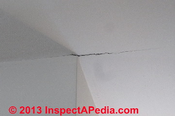 Drywall crack at wall/ceiling stress point (C) Daniel Friedfman