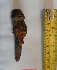 Iron nail fragment,  Eype Beach, Dorset (C) InspectApedia.com Alex
