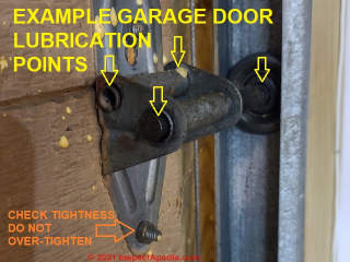 Garage door roller assembly lubrication points (C) Daniel Friedman InspectApedia.com