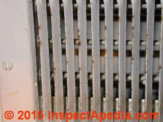 Gray house dust normal deposit at an air supply register (C) Daniel Friedman InspectApedia