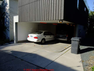 Horizontal garage door at a Minneapolis home (C) Daniel Friedman at InspectApedia.com