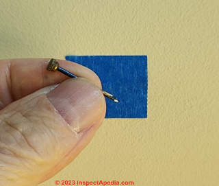 How to nail into plaster or drywall without damage or dust (C) Daniel Friedman at InspectApedia.com
