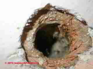 Insulation retrofit blow in hole (C) Daniel Friedman