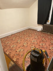 Linoleum rug tested found no asbestos (C) InspectApedia.com Christine