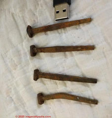 Old nails from a church pew (C) InspectApedia.com Caisse