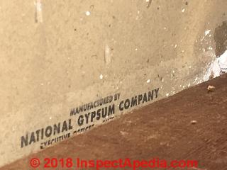 National Gypsum drywall on a basement ceiling, estimated ca 1970 (C) InspectApedia.com -D.N. 