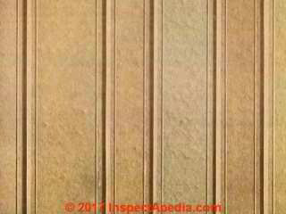 Nu-Wood wall & ceiling patterns & textures aid in identification of Nu-Wood (C) InspectApedia.com 2017