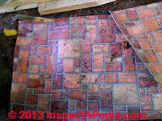 Red brick pattern sheet flooring (C) InspectAPedia.com