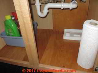 Kitchen base cabinet interior floor and back repairs (C) Daniel Friedman