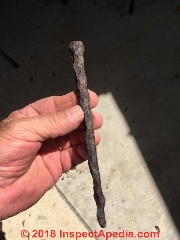 Wavy iron spike, hand wrought, Florida (C) InspectApedia.com LaCorte