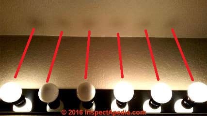 Thermal tracking deposition stains over light bulbs (C) InspectApedia.com BR