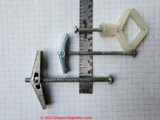 Examples of toggle bolts of various sizes and screw types (C) Daniel Friedman at InspectApedia.com