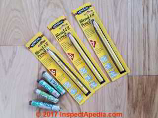 Wax color matched sticks help repair wood floors, paneling, furniture (C) Daniel Friedman