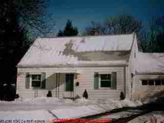 Snow melt shows areas of missing under roof insulation (C) Daniel Friedman