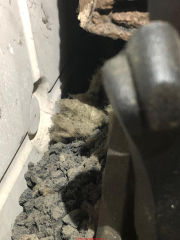 Dirty mineral wool, not mold, at a gas fireplace (C) InspectApedia.com Sarah