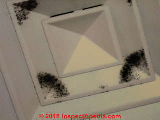 Mold on an HVAC air supply register (C) Daniel Friedman at InspectApedia.com