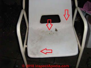 Mold contaminated shower chair in the UK (C) InspectApedia.com Marks M