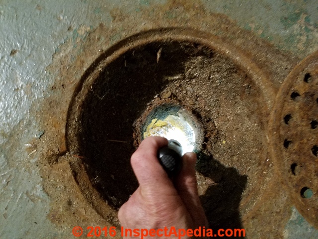 garage floor drain clogged