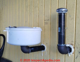 Oil fill & vent piping outdoors completed at oil tank replacement (C) Daniel Friedman at InspectApedia.com