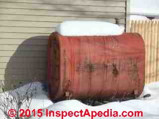 Oil tank with heat tapes and snow cover (C) Daniel Friedman