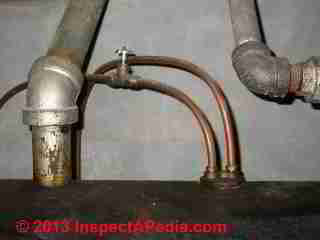 Dual oil line hookup at oil burner © D Friedman at InspectApedia.com 