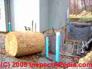 Buried oil tank being removed during building foundation repairs (C) Daniel Friedman