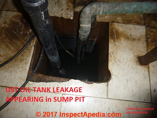 Heating oil filling the sump pit of this home after an oil tank underground leak (C) InspectApedia.com  and  ASHI inspector Lawrence Transue Dec 2017