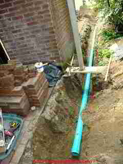 Plastic sewer pipe installation © D Friedman at InspectApedia.com 