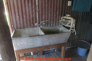 Cast concrete laundry sink with and wringer, Akaroa New Zealand (C) Daniel Friedman