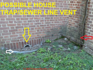 Possible house trap plumbing or sewer line vent, improperly installed, unsafe and risking sewer backup (C) InspectApedia.com Dovber Kahn