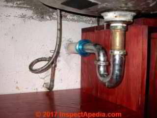 Chrome plated brass plumbing trap, badly corroded, leaky (C) Daniel Friedman InspectApedia.com