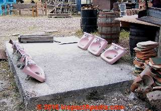 Pink enameled cast iron sinks for sale at the Junkatique highway sales outside Dolores Hidalgo, Guanajuato, Mexico (C) Daniel Friedman