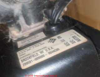 Back side and stickers on a Fleck water softener control head (C) InspectApedia.com Chris