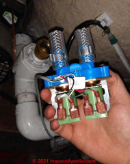 Replacement for double water inlet solenoid valve (C) InspectApedia.com Dorothy