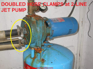 Doubling the hose clamps at the ABS well pipe connections to the jet pump reduces leak risk (C) Daniel Friedman at Inspectapedia.com
