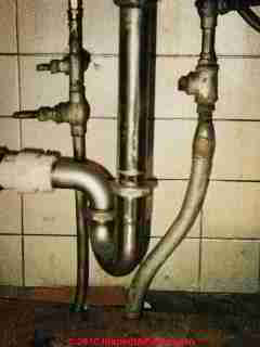 Lead water supply pipe in a builiding (C) Daniel Friedman at InspectApedia.com