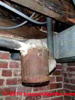 Paint can used for home made plumbing trap (C) InspectApedia.com Steve Smallman