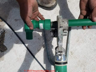 Heat welding PPR plastic water piping (C) Daniel Friedman at InspectApedia.com