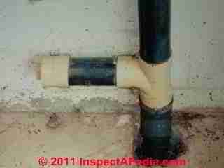 ABS PVC drain pipe mixed © D Friedman at InspectApedia.com 
