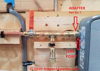 Leak at Rheem RTEX-13 electric tankless water heater (C) InspectApedia.com Daniel Friedman