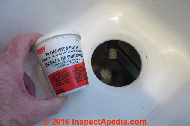 installing bathroom sink drain with plumbers putty