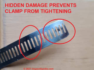 Hidden defects at this stainless steel hose clamp prevented it from tightening enough to stop a leak (C) Daniel Friedman at InspectAPedia.com