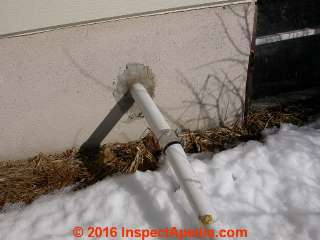 Sump pump discharge line outside (C) Daniel Friedman