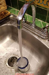Tap water chosen downstream from water softener in San Miguel De Allende will measure water hardness or softness after passing through the water softener (C) Daniel Friedman at InspectApedia.com