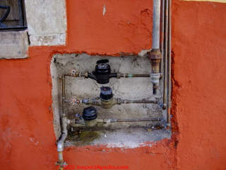 Ganged water meters, Guanajuato (C) Daniel Friedman at InspectApedia.com