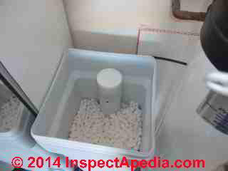 Water softener brine tank in normal condition (C) Daniel Friedman Mark Klug