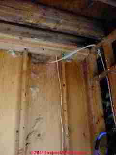 Roof leak stains from below © D Friedman at InspectApedia.com 