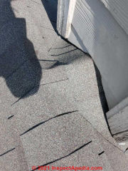 Roofing defect in a bad roof job (C) InspectApedia.com